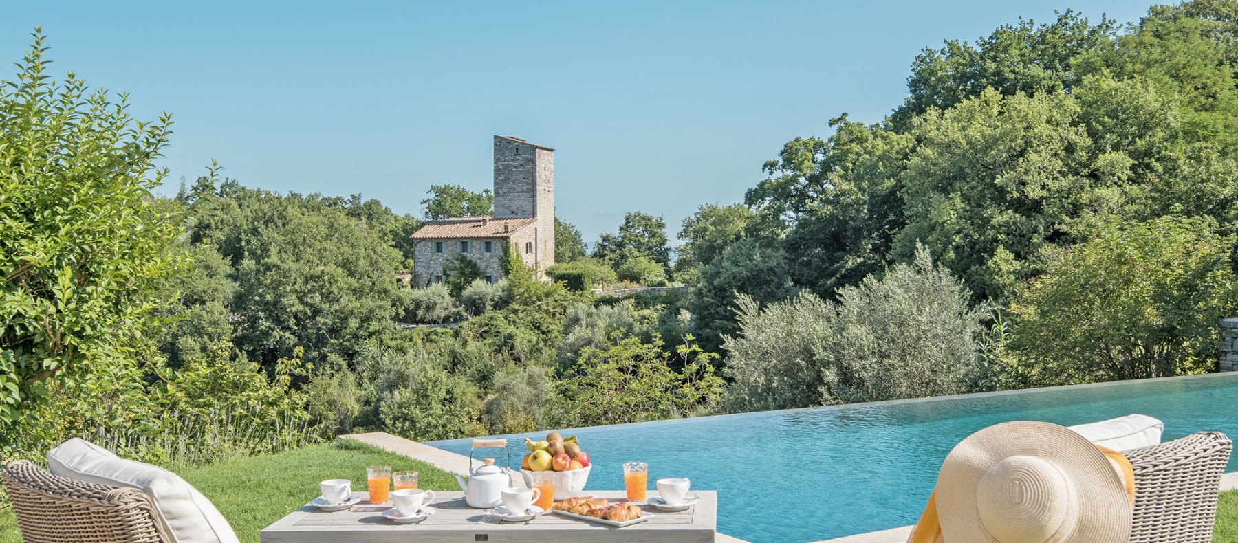 Beautiful blue sea bay with white walled building